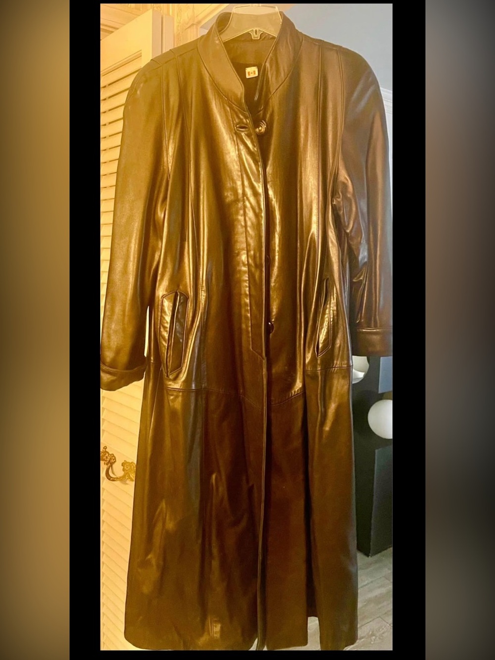 Women’s Full Length black leather trench coat with a vintage vibe